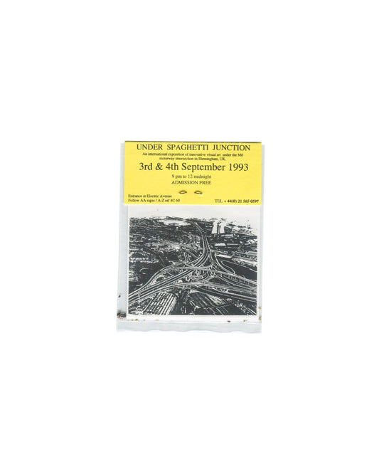 Back (event details / aerial view) Under Spaghetti Junction, Fine Rats International, Birmingham, 1993. Exhibition invitation back, in clear plastic pouch: upper third, yellow ground with event details in black type — "UNDER SPAGHETTI JUNCTION / An international exposition of innovative visual art under the M6 motorway intersection in Birmingham, UK. / 3rd & 4th September 1993 / 9 pm to 12 midnight / ADMISSION FREE / Entrance at Electric Avenue / Follow AA signs / A-Z ref 4C 60 / TEL + 44(0) 21 565 0597"; l