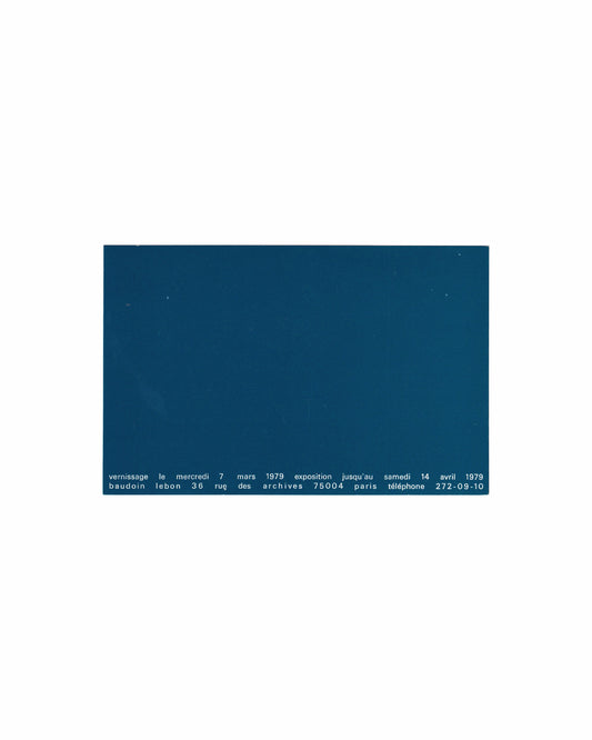 Reverse of 1979 Annie Gramain exhibition invitation, Galerie Baudoin Lebon, Paris. Verso showing plain deep teal card stock with two lines of white spaced sans-serif type at the lower edge: 'vernissage le mercredi 7 mars 1979 exposition jusqu'au samedi 14 avril 1979 / baudoin lebon 36 rue des archives 75004 paris téléphone 272-09-10'. The upper field is entirely unprinted. 14 × 9 cm.