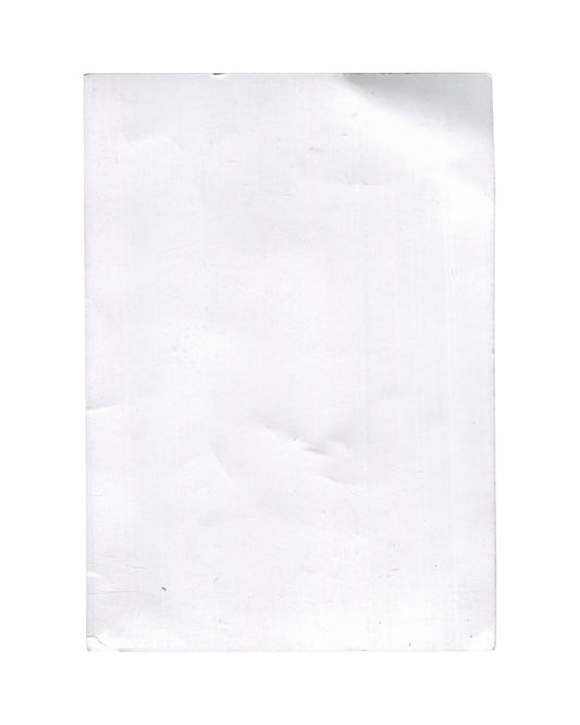 Reverse of 2024 Ne travaillez jamais exhibition invitation card, 22 rue Visconti, Paris — verso showing plain unprinted white card stock with visible handling marks, surface rubbing, light creasing, and pressure marks consistent with storage and circulation.