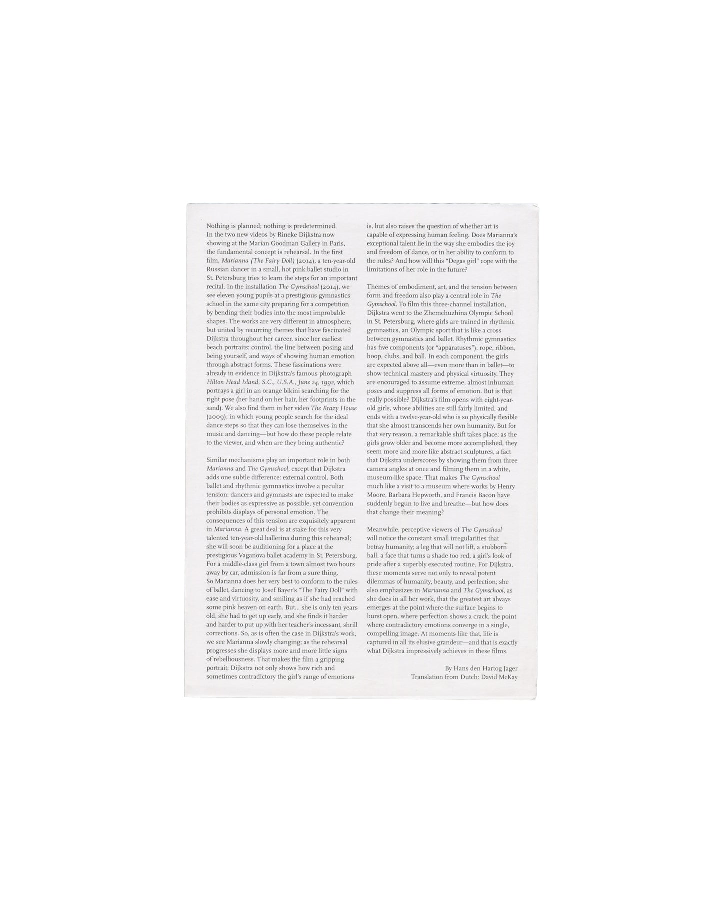 Handout back — critical text Rineke Dijkstra, The Gymschool, St Petersburg / Marianna (The Fairy Doll), Galerie Marian Goodman, Paris, 2015. Exhibition handout back panel: white paper with critical essay by Hans den Hartog Jager in two columns of small black serif type, translated by David McKay. Text discusses Dijkstra's video works in relation to embodiment, performance, freedom and control in ballet and rhythmic gymnastics training, with reference to Marianna's rehearsal at the Vaganova Academy and the Z