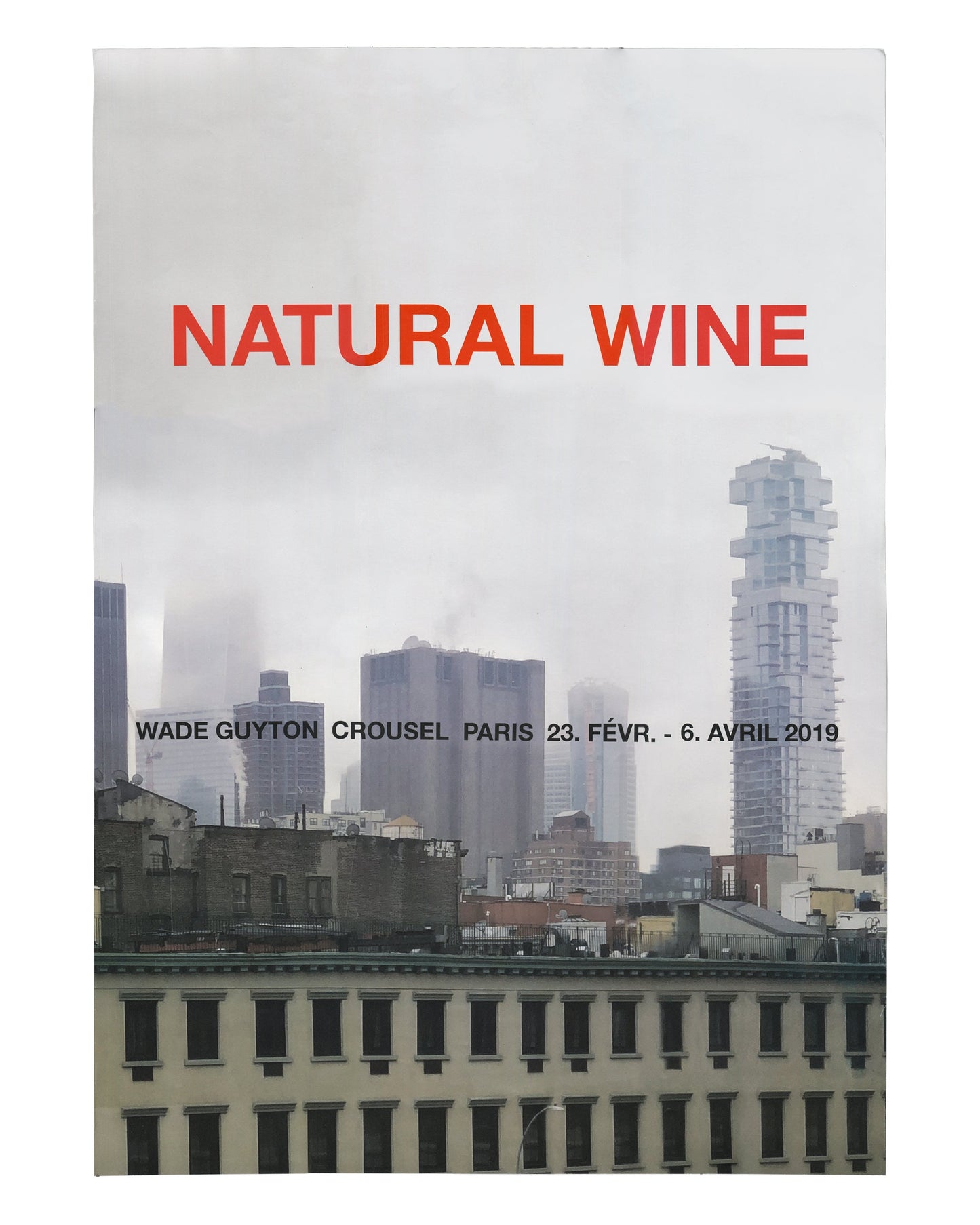 Exhibition poster, Wade Guyton, Natural Wine, Galerie Chantal Crousel, Paris, 2019. Offset print, A1, 59.4 × 84.1 cm. Grey-toned photograph of New York skyline with construction cranes and misty atmosphere; bold red sans-serif title ‘NATURAL WINE’ upper third; black text below: ‘WADE GUYTON CROUSEL PARIS 23. FÉVR. – 6. AVRIL 2019’. Very good condition with light fold lines.
