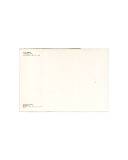 Postcard verso, Keith Haring, Untitled, 1985, Artpost, New York, 1987. Cream/white ground, undivided back. Upper left: black sans-serif text — 'KEITH HARING / UNTITLED, 1985 / ACRYLIC ON CANVAS, 5′ × 5′'. Lower left: '©1987 KEITH HARING / ARTPOST / BOX 861 CANAL STA · NY, NY 10013 / AP562'. Light age toning, minor surface marks, unposted, good vintage condition.