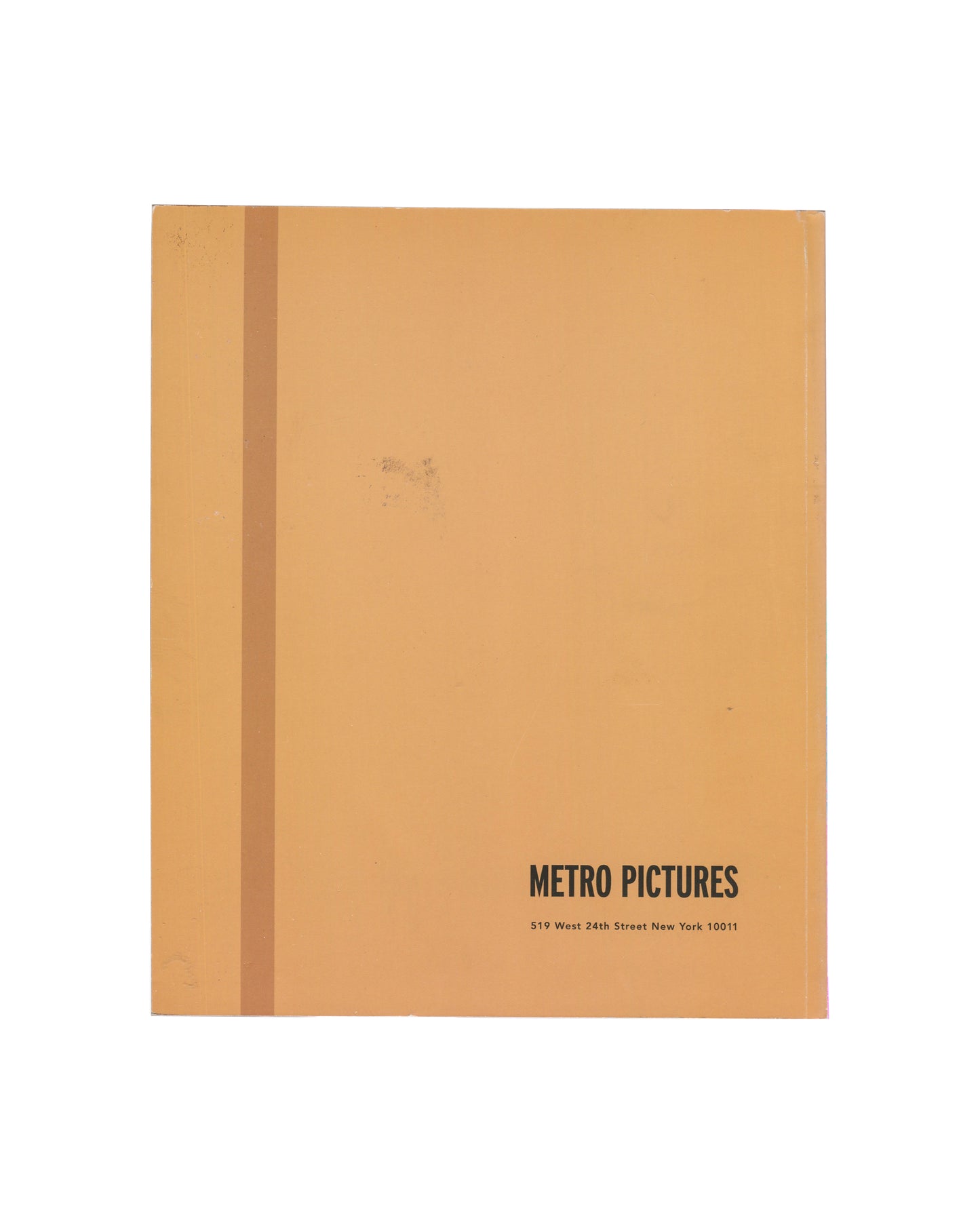 back cover — plain flat orange/tan card, "METRO PICTURES / 519 West 24th Street New York 10011" in bold black sans-serif lower right