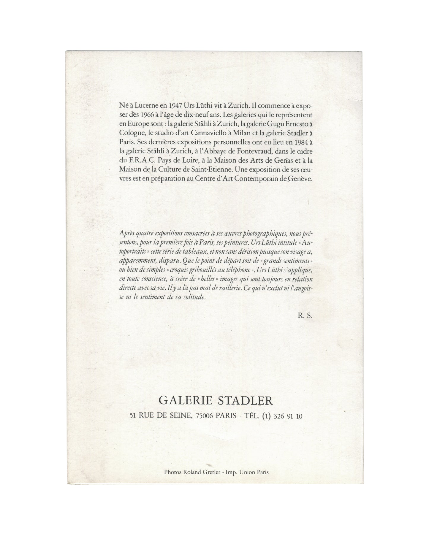 Reverse of 1985 Urs Lüthi Autoportraits invitation, Galerie Stadler, Paris, showing a biographical note and critical text by R. S. in roman and italic serif type, with gallery address 51 Rue de Seine, 75006 Paris at the foot, and photo credit Roland Gretler / Imp. Union Paris.
