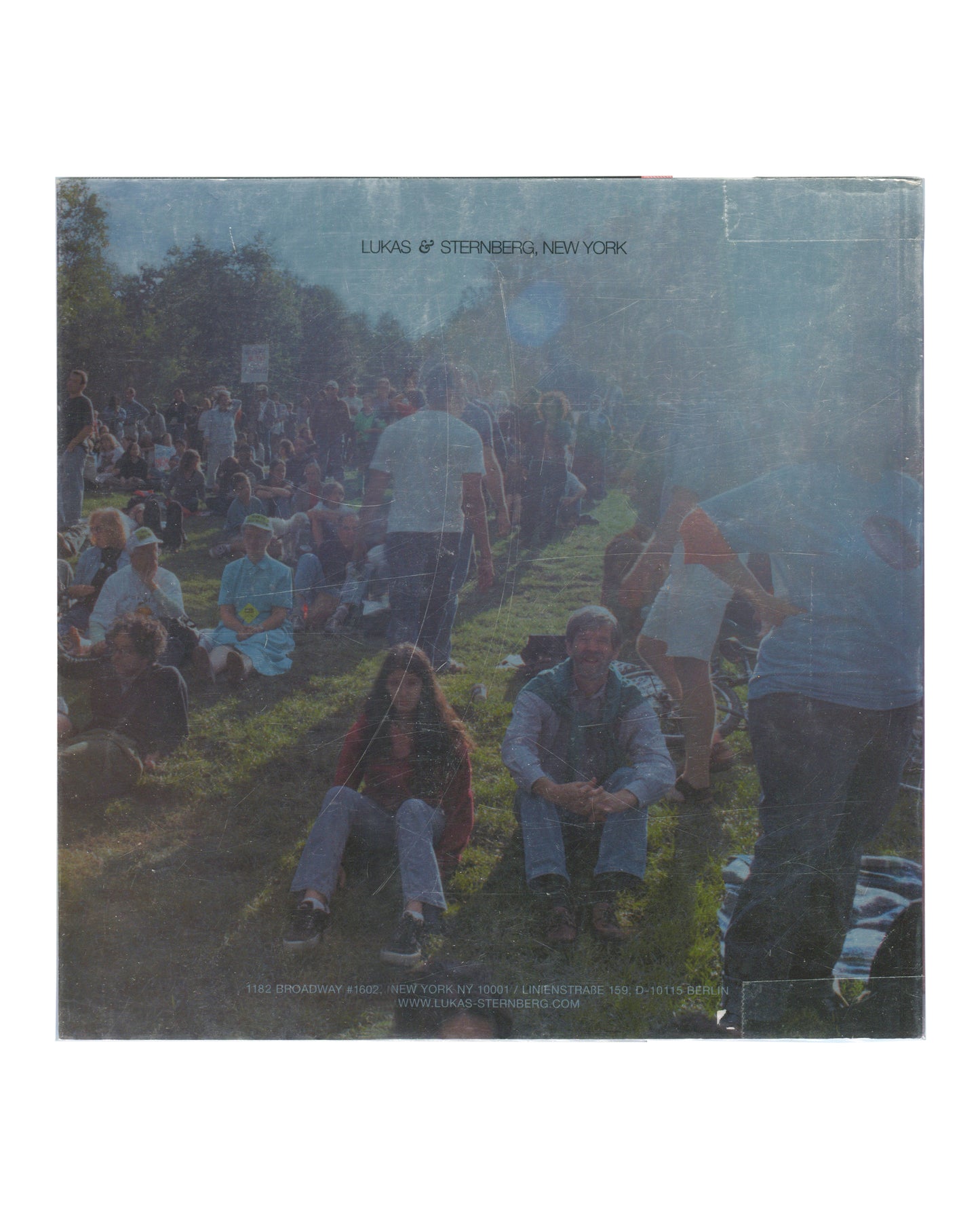 Josephine Meckseper, Catalogue No. 1, Lukas & Sternberg 2004, outdoor crowd scene, smoke, Lukas & Sternberg New York