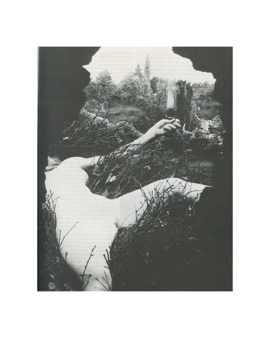 `New Observations No. 84, Alchemy — interior spread. Black and white photograph of Marcel Duchamp's Étant donnés, 1946–66: a reclining female figure amid twigs and branches, one arm raised holding a gas lamp, viewed through a torn aperture in a dark ground.