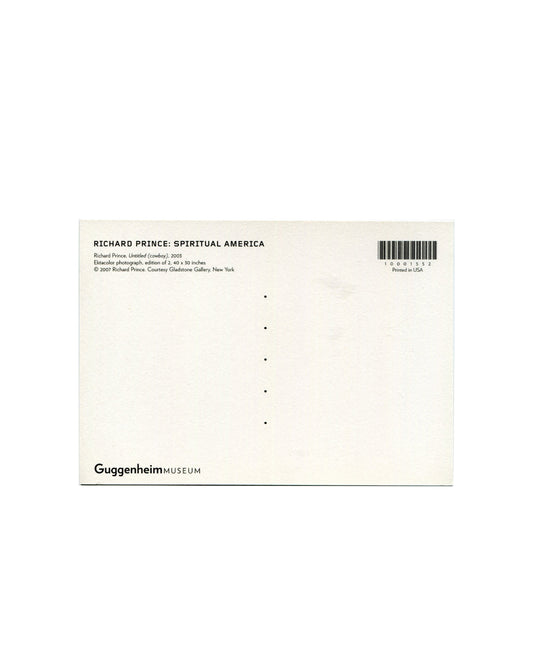 Postcard verso, Richard Prince, Untitled (cowboy), 2003, Solomon R. Guggenheim Museum, New York, 2007. White ground, divided postal back. Upper left: bold black sans-serif — 'RICHARD PRINCE: SPIRITUAL AMERICA'; below: 'Richard Prince, Untitled (cowboy), 2003 / Ektacolor photograph, edition of 2, 40 × 30 inches / © 2007 Richard Prince, Courtesy Gladstone Gallery, New York'. Upper right: barcode — '10001552'; 'Printed in USA'. Lower left: 'GuggenheimMUSEUM' logotype. Light handling only, very good condition.