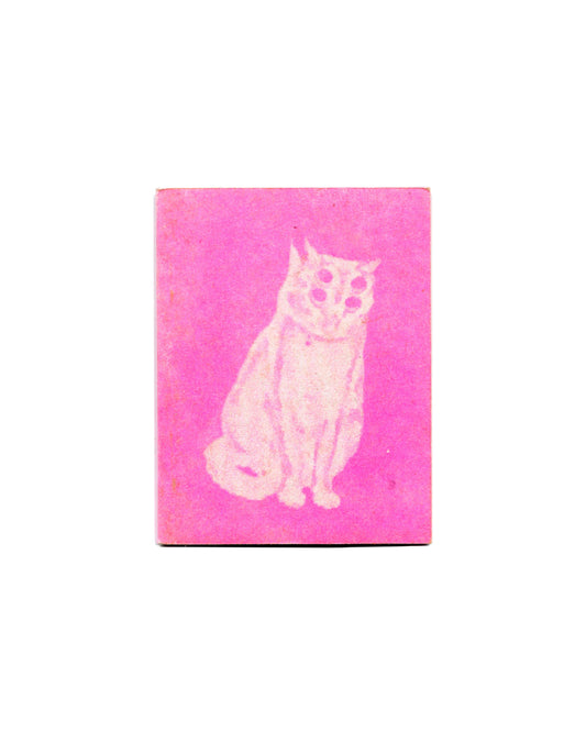 Reverse of Mladen Stilinović, The Praise of Laziness, Gato Negro, Mexico City, 2015, showing a risograph-printed pale pink seated cat with hollow circular eyes on a magenta ground.