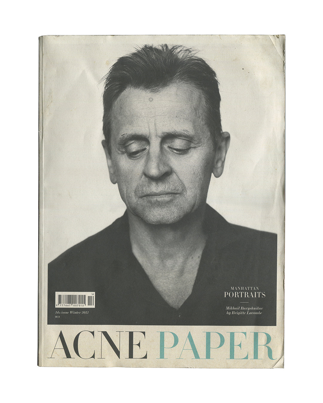 Original 2012 Acne Paper No. 14 magazine, Manhattan Portraits issue, Acne Studios, Winter 2012. Cover showing Brigitte Lacombe's portrait of Mikhail Baryshnikov against a dark background, with the Acne Paper logotype in large serif type at the foot of the page.