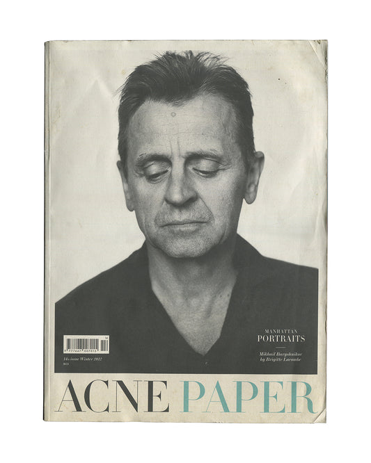 Original 2012 Acne Paper No. 14 magazine, Manhattan Portraits issue, Acne Studios, Winter 2012. Cover showing Brigitte Lacombe's portrait of Mikhail Baryshnikov against a dark background, with the Acne Paper logotype in large serif type at the foot of the page.