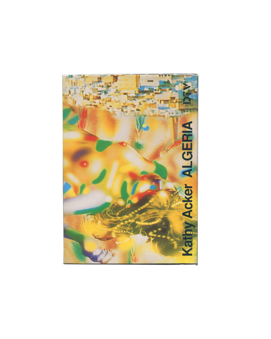 Front cover of 1988 Kathy Acker Algeria French edition, Le Dernier Terrain Vague / DTV Compact Livre, Paris — full-bleed image by Kiki Picasso: saturated composite of fragmented urban photography, abstracted figures, and colour fields in yellow, green, orange, and blue; Kathy Acker in black diagonal type at lower left; ALGERIA in large bold black capitals; DTV logo at upper right; cover design functioning as graphic assault and media noise.