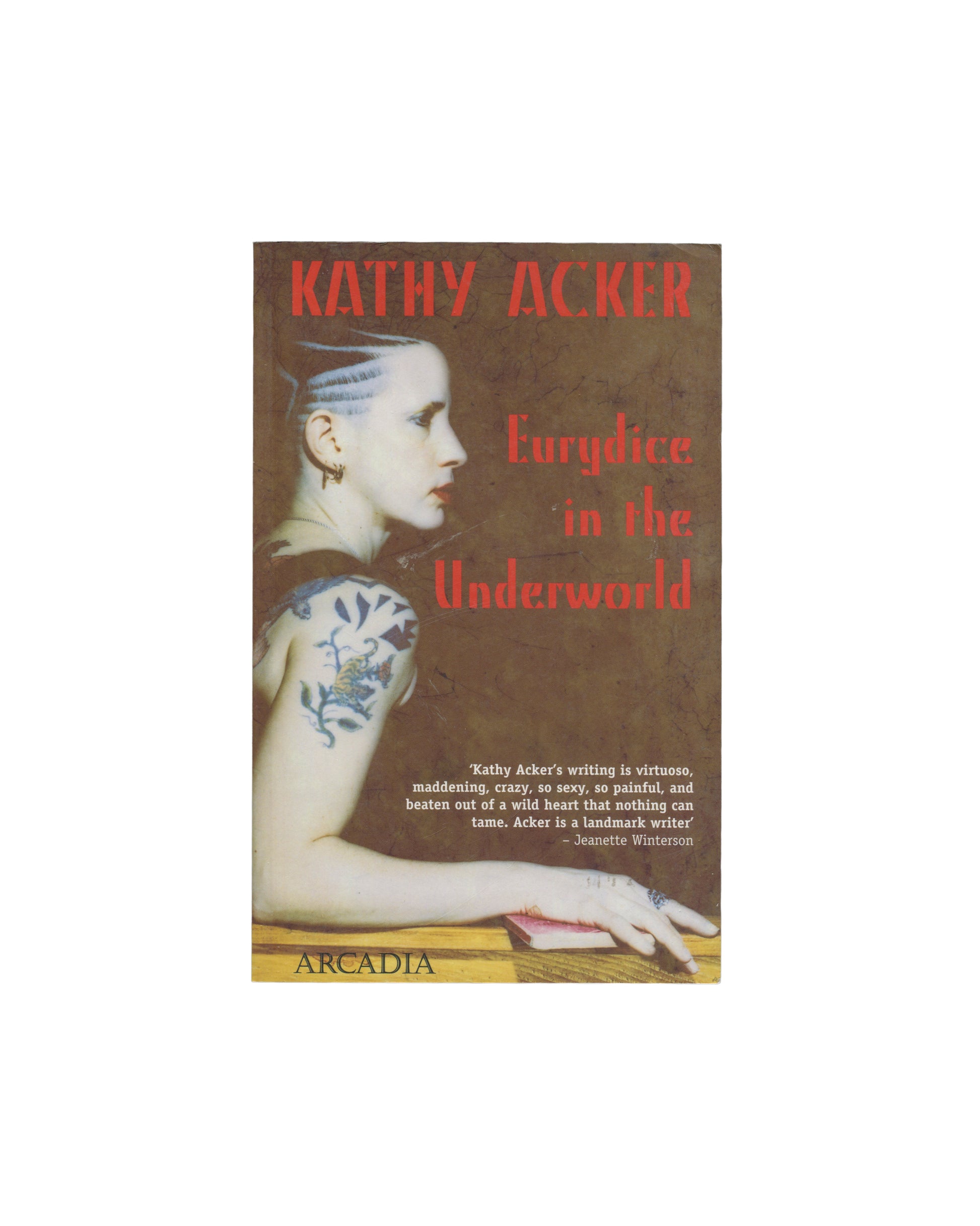 Book cover of 'Eurydice in the Underworld' by Kathy Acker, published by Arcadia. The cover features a sepia-toned portrait of a woman with blue hair and tattoos, with the title in red text.