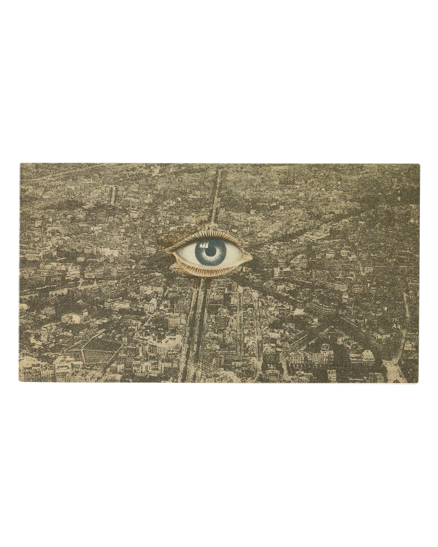 Original 1990 Collages Surréalistes exhibition invitation, Galerie Zabriskie, Paris — cover reproducing Georges Hugnet, Le Sphinx du Moulin Vert, 1934: aerial black-and-white photograph of Paris with radiating boulevards, a single realistic eye with lashes montaged at centre.