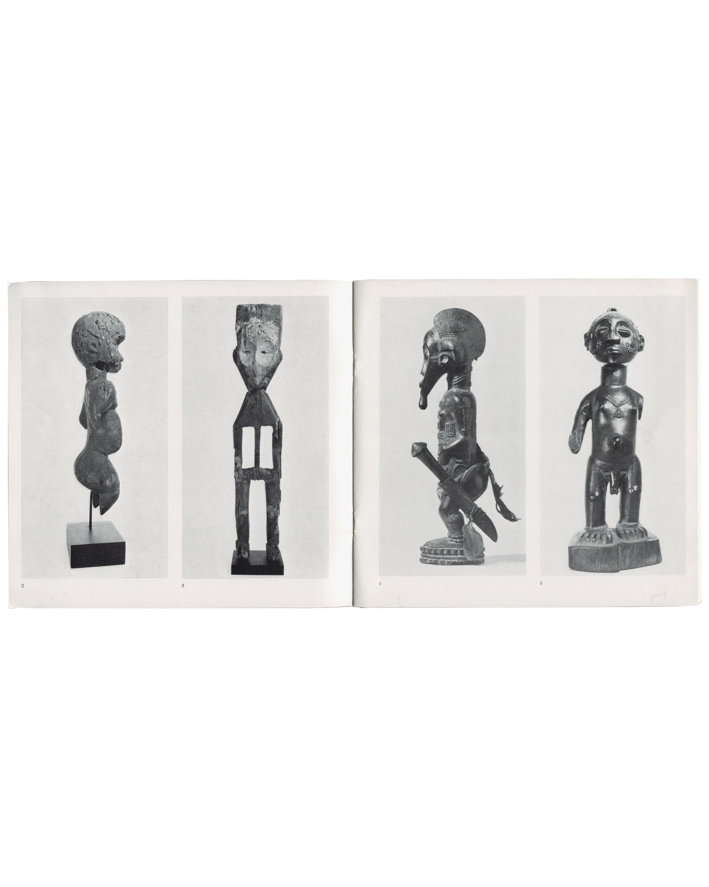 Gordon House, African Tribal Sculpture, The Arcade Gallery, 1976, interior spread with four sculptures, black-and-white