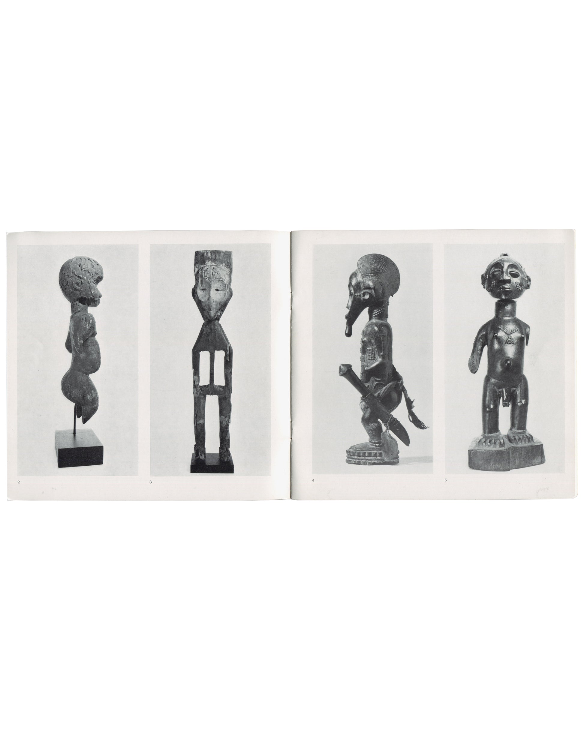 Gordon House, African Tribal Sculpture, The Arcade Gallery, 1976, interior spread with four sculptures, black-and-white