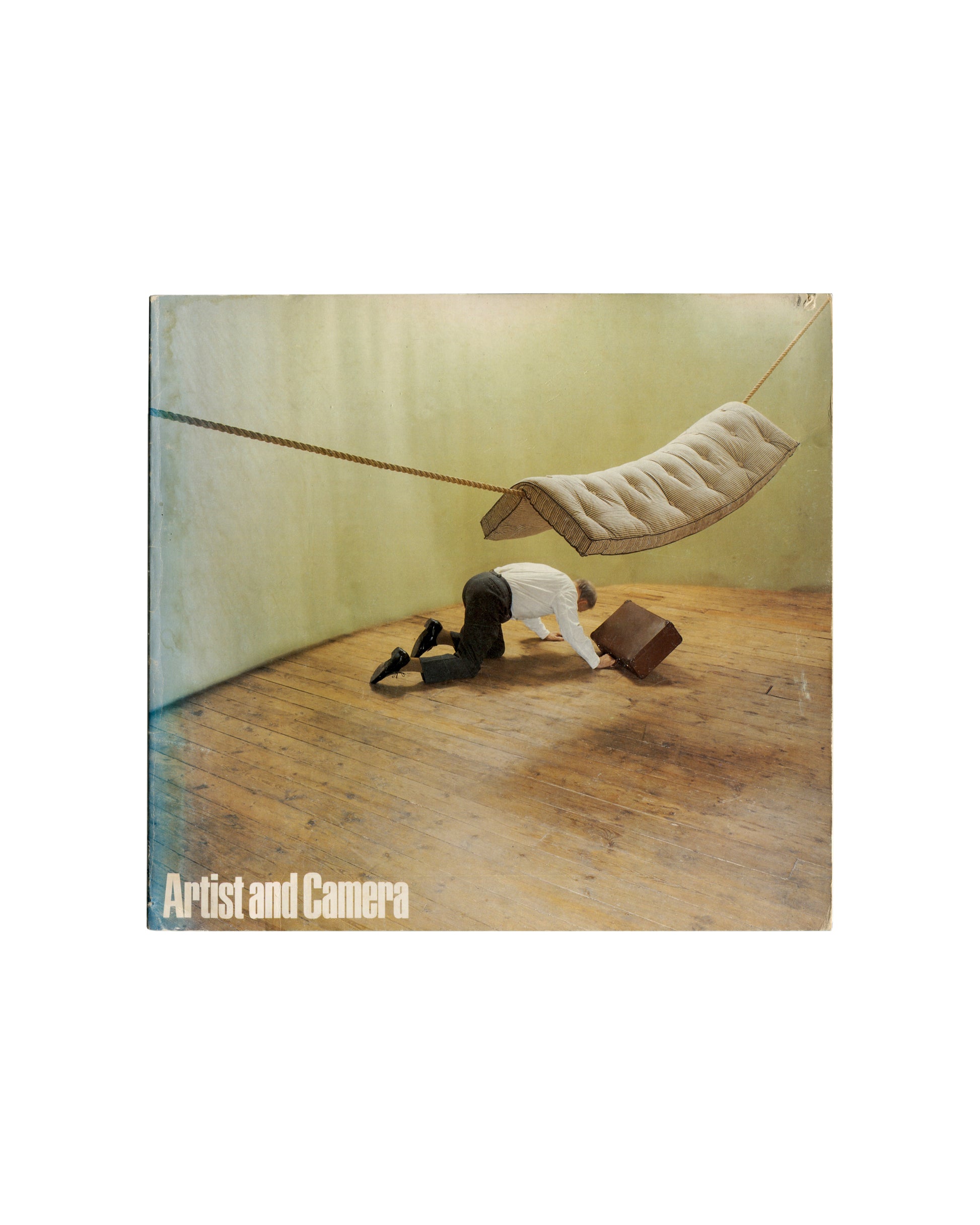Boyd Webb work with figure and suspended mattress, Artist and Camera, Arts Council of Great Britain, 1980, front cover