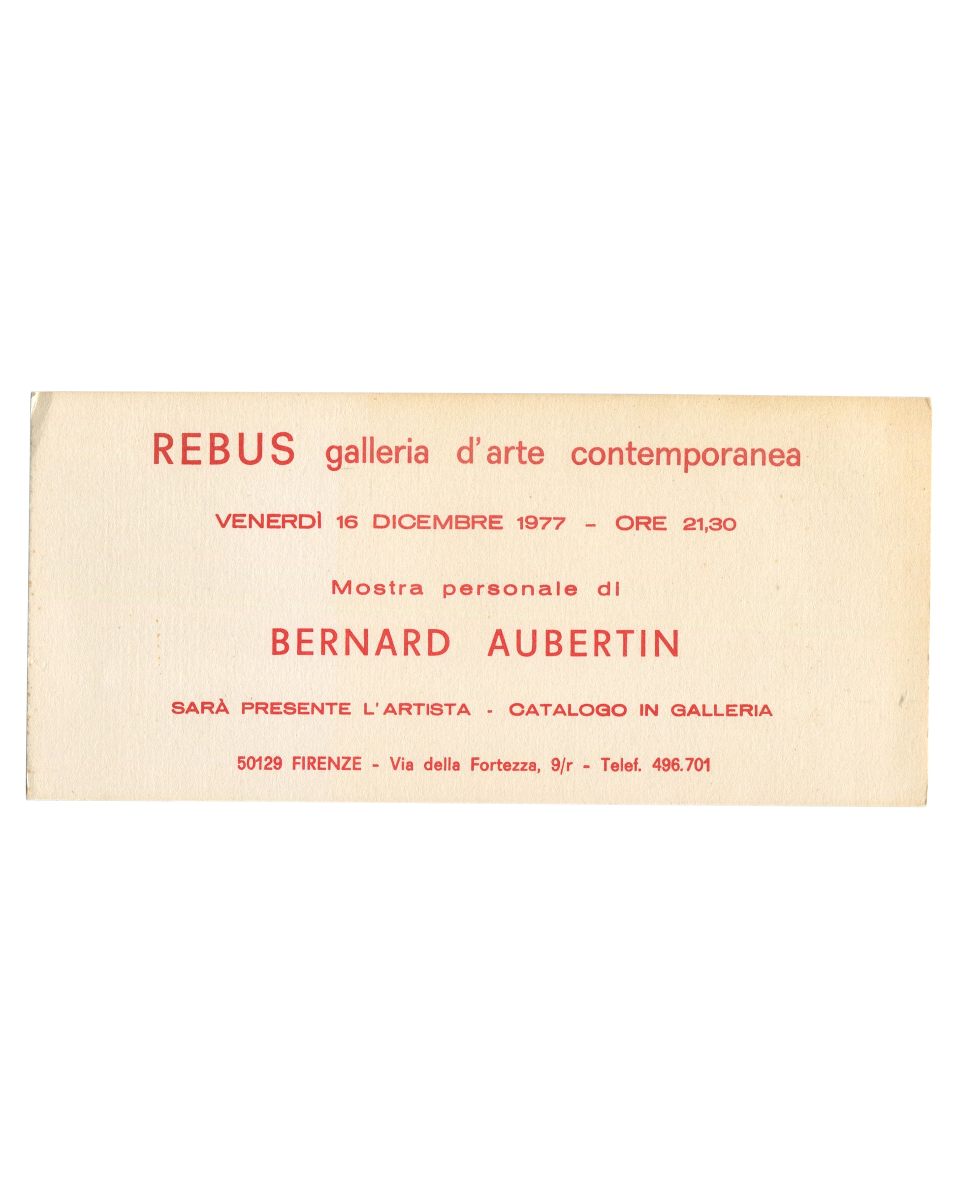 Original 1977 Bernard Aubertin exhibition invitation card, Rebus Galleria d'Arte Contemporanea, Florence — recto printed entirely in red on textured cream handmade-style paper; horizontal format; REBUS galleria d'arte contemporanea in mixed serif and sans-serif type at top; VENERDÌ 16 DICEMBRE 1977 – ORE 21,30; Mostra personale di in italic; BERNARD AUBERTIN in large spaced capitals; SARÀ PRESENTE L'ARTISTA · CATALOGO IN GALLERIA; address 50129 FIRENZE – Via della Fortezza, 9/r – Telef. 496.701 at foot.