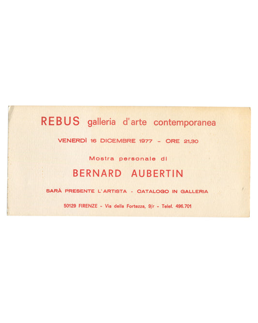 Original 1977 Bernard Aubertin exhibition invitation card, Rebus Galleria d'Arte Contemporanea, Florence — recto printed entirely in red on textured cream handmade-style paper; horizontal format; REBUS galleria d'arte contemporanea in mixed serif and sans-serif type at top; VENERDÌ 16 DICEMBRE 1977 – ORE 21,30; Mostra personale di in italic; BERNARD AUBERTIN in large spaced capitals; SARÀ PRESENTE L'ARTISTA · CATALOGO IN GALLERIA; address 50129 FIRENZE – Via della Fortezza, 9/r – Telef. 496.701 at foot.