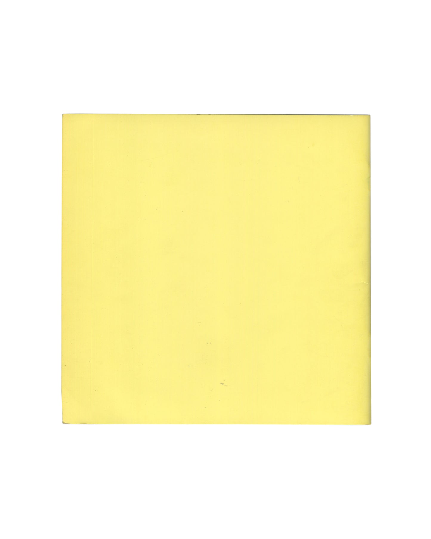 Reverse of 1970 Larry Bell, Robert Irwin, Doug Wheeler Tate Gallery catalogue. Plain pale yellow back cover showing faint ghost impression of handwritten or drawn text visible through the paper, with minor handling marks and age toning.