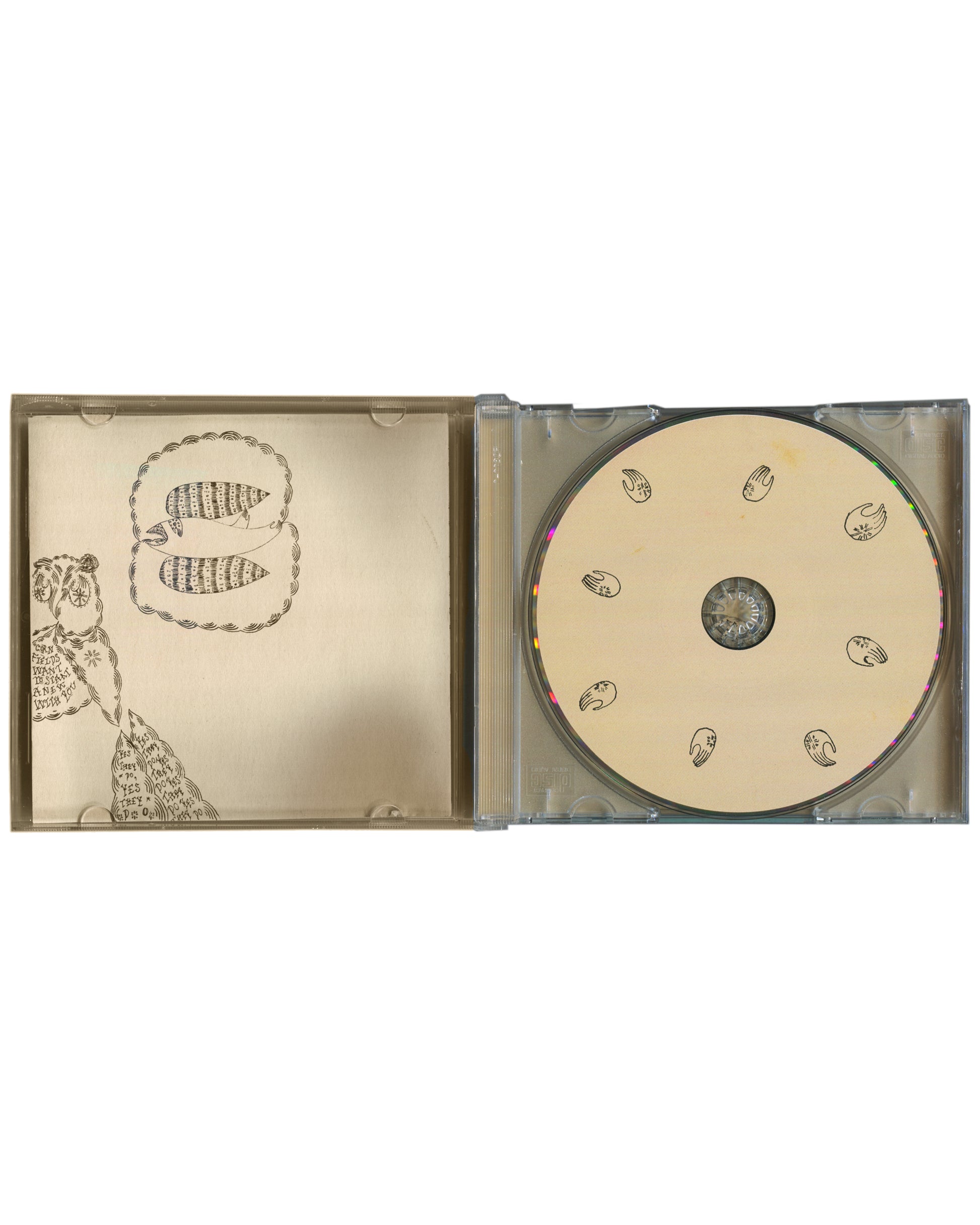 Open jewel case of 2004 Devendra Banhart Rejoicing in the Hands — left tray with inner booklet panel showing two fish in a rope oval; right tray holding the printed disc with scattered hand-drawn comma-like figures on cream ground