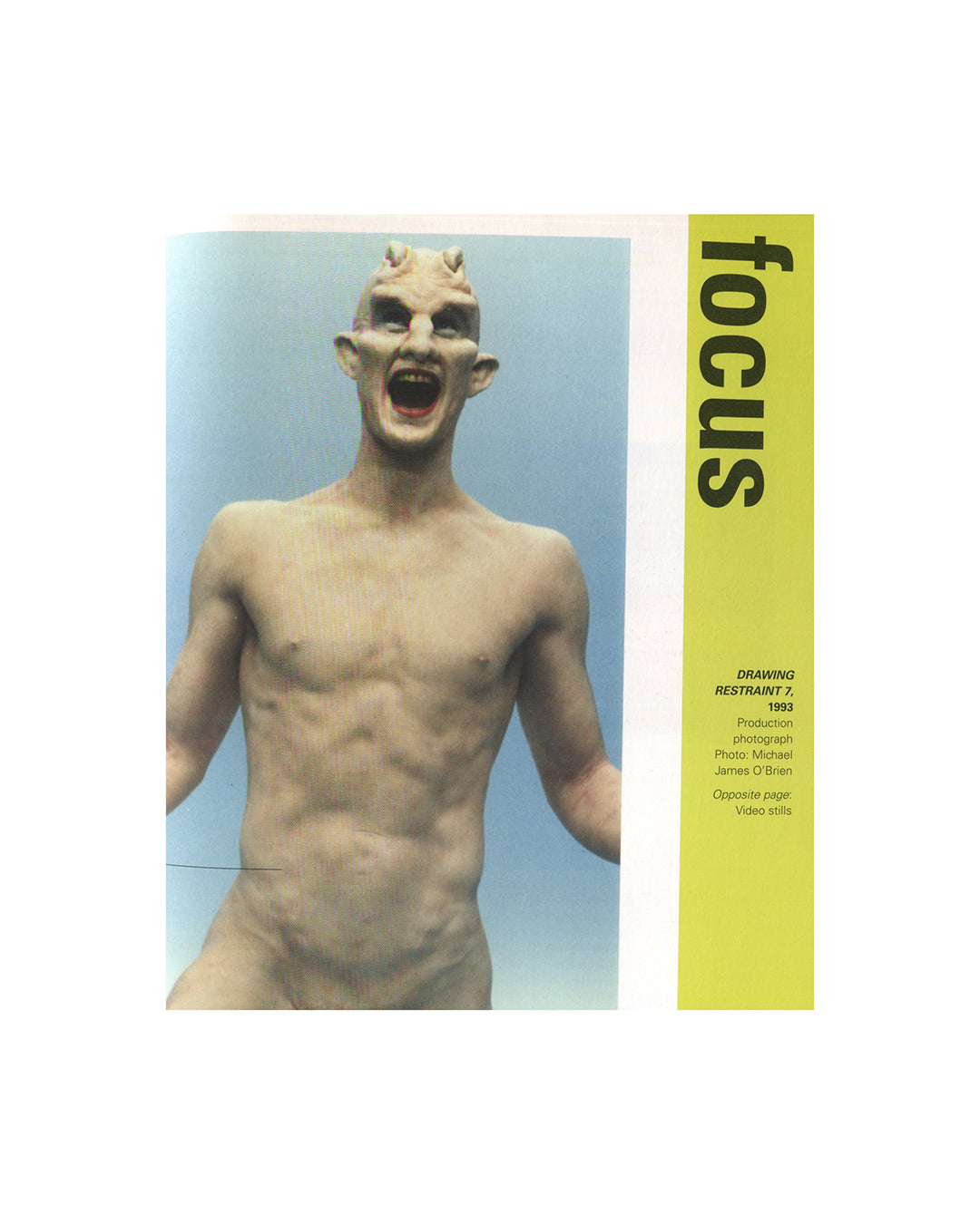 Interior spread from 2007 Matthew Barney Supercontemporary, Electa. Focus section showing a production photograph of Drawing Restraint 7, 1993, by Michael James O'Brien: a figure with horned prosthetic head, open mouth, and muscular body against a pale blue sky.