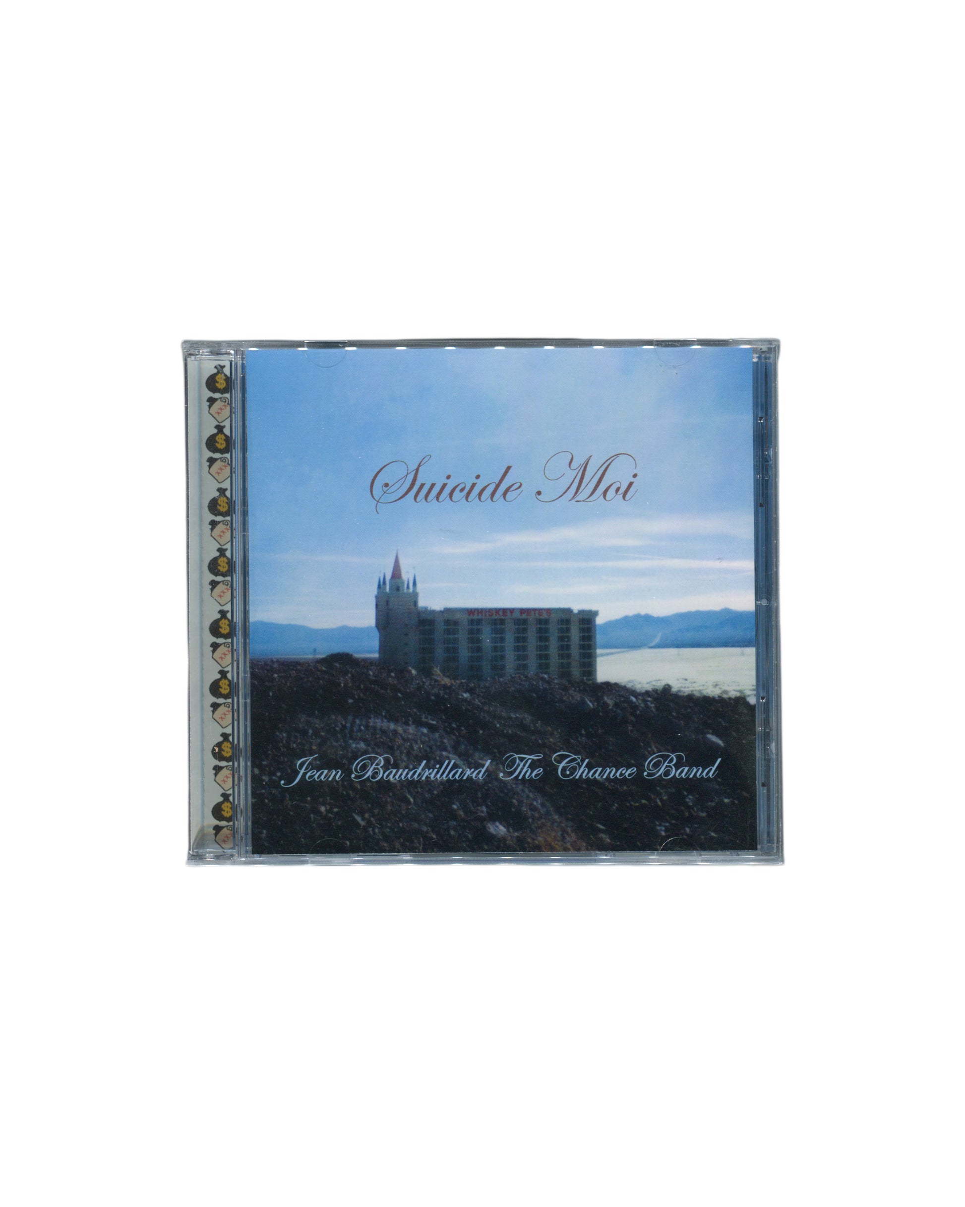 Original 2002 Jean Baudrillard & The Chance Band Suicide Moi CD, Compound Annex Records, Los Angeles — jewel case front with blue-sky photographic cover showing a large hotel-casino building on a rocky hillside beside a lake, title Suicide Moi in pink cursive script at top, artist name Jean Baudrillard The Chance Band in white serif text at foot