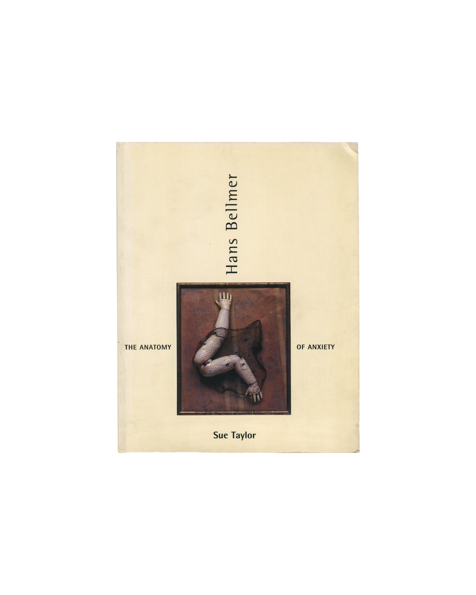 Hans Bellmer, The Anatomy of Anxiety, Sue Taylor, MIT Press, 2002, front cover, doll limbs framed in brown, cream wrapper