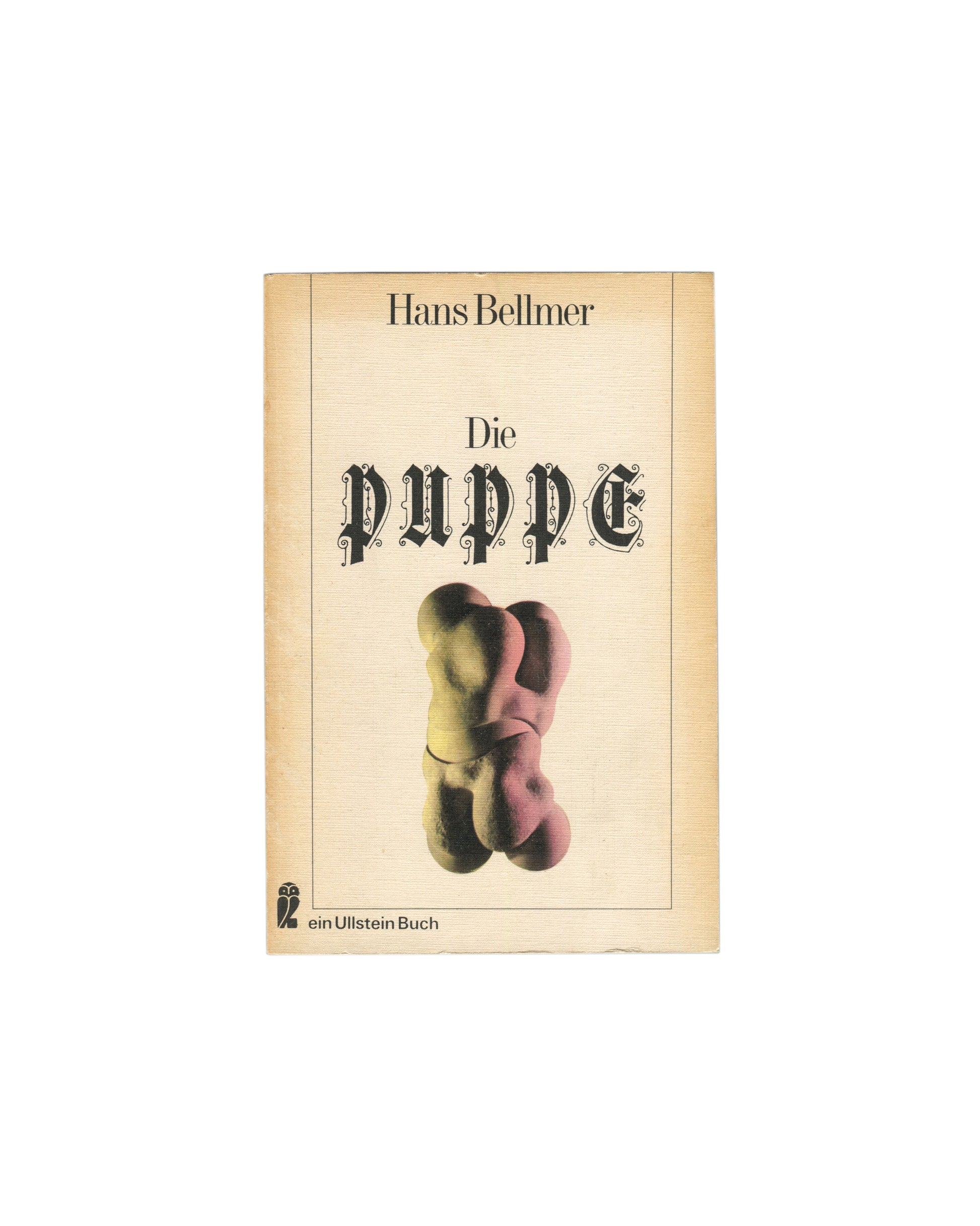 Original 1976 Hans Bellmer Die Puppe paperback, Ullstein Verlag, Frankfurt — cream textured cover with centred colour photograph of a fragmented doll torso in pink and olive tones, three titles in black serif type below: Die Puppe / Die Spiele der Puppe / Die Anatomie des Bildes
