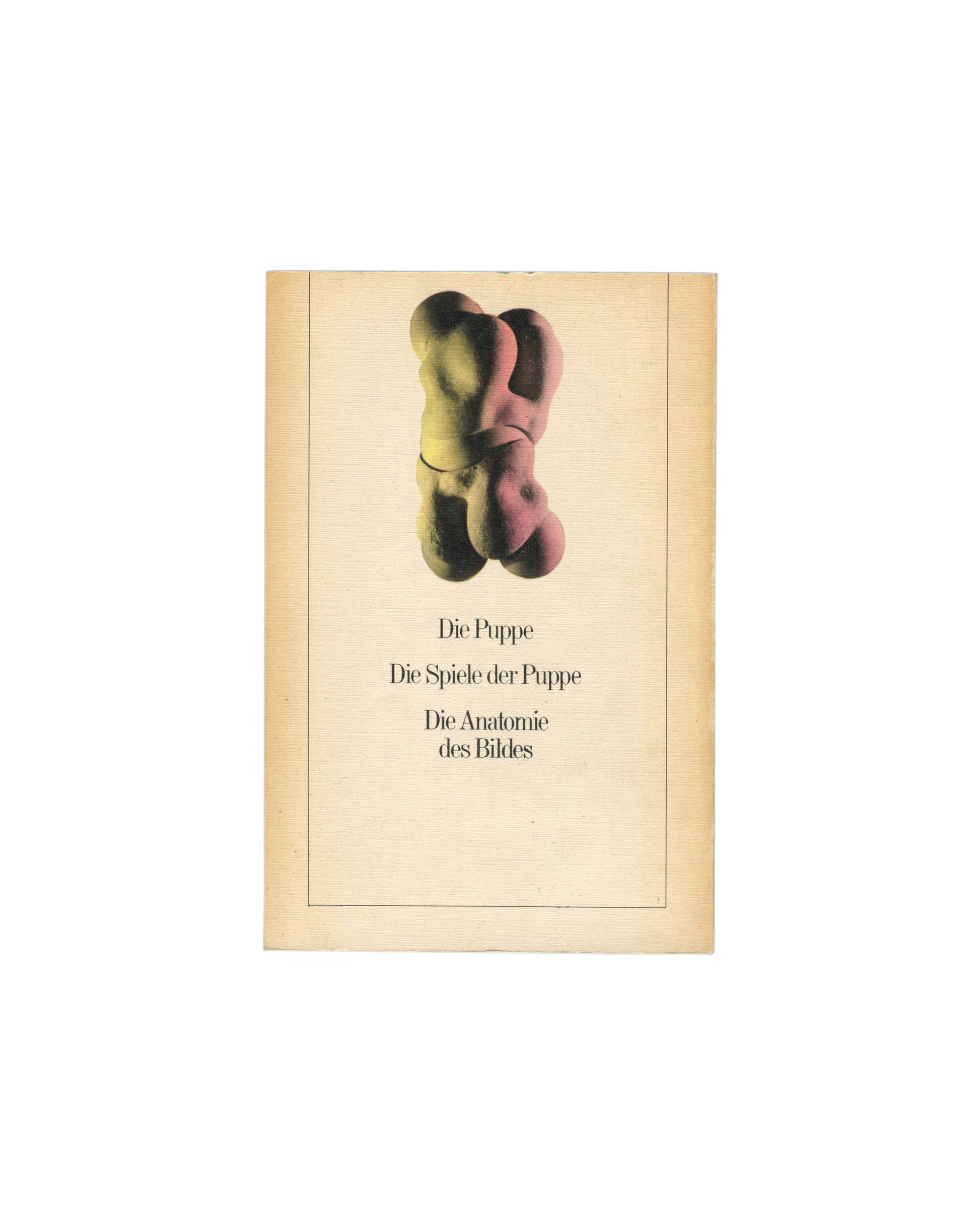 Reverse of 1976 Hans Bellmer Die Puppe, Ullstein Verlag — plain cream back cover, no text or imagery, showing age toning and light wear to edges
