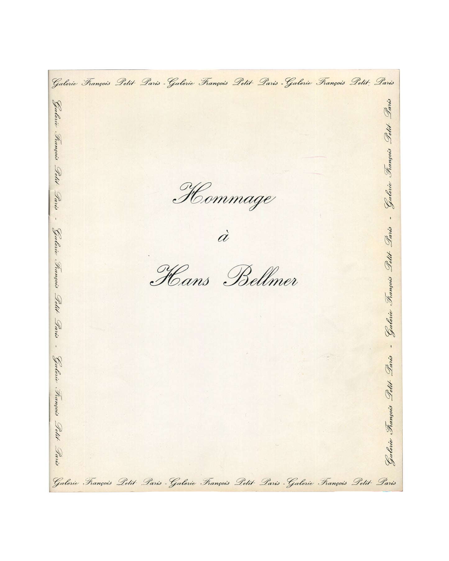 Original 1976 Hans Bellmer Hommage à Hans Bellmer exhibition catalogue, Galerie François Petit, Paris. Front cover showing cream printed wrappers with ornate calligraphic title 'Hommage à Hans Bellmer' centred in italic script, framed on all four sides by a repeated border of 'Galerie François Petit Paris' in cursive lettering. Staple-bound, 25 × 20.9 cm.