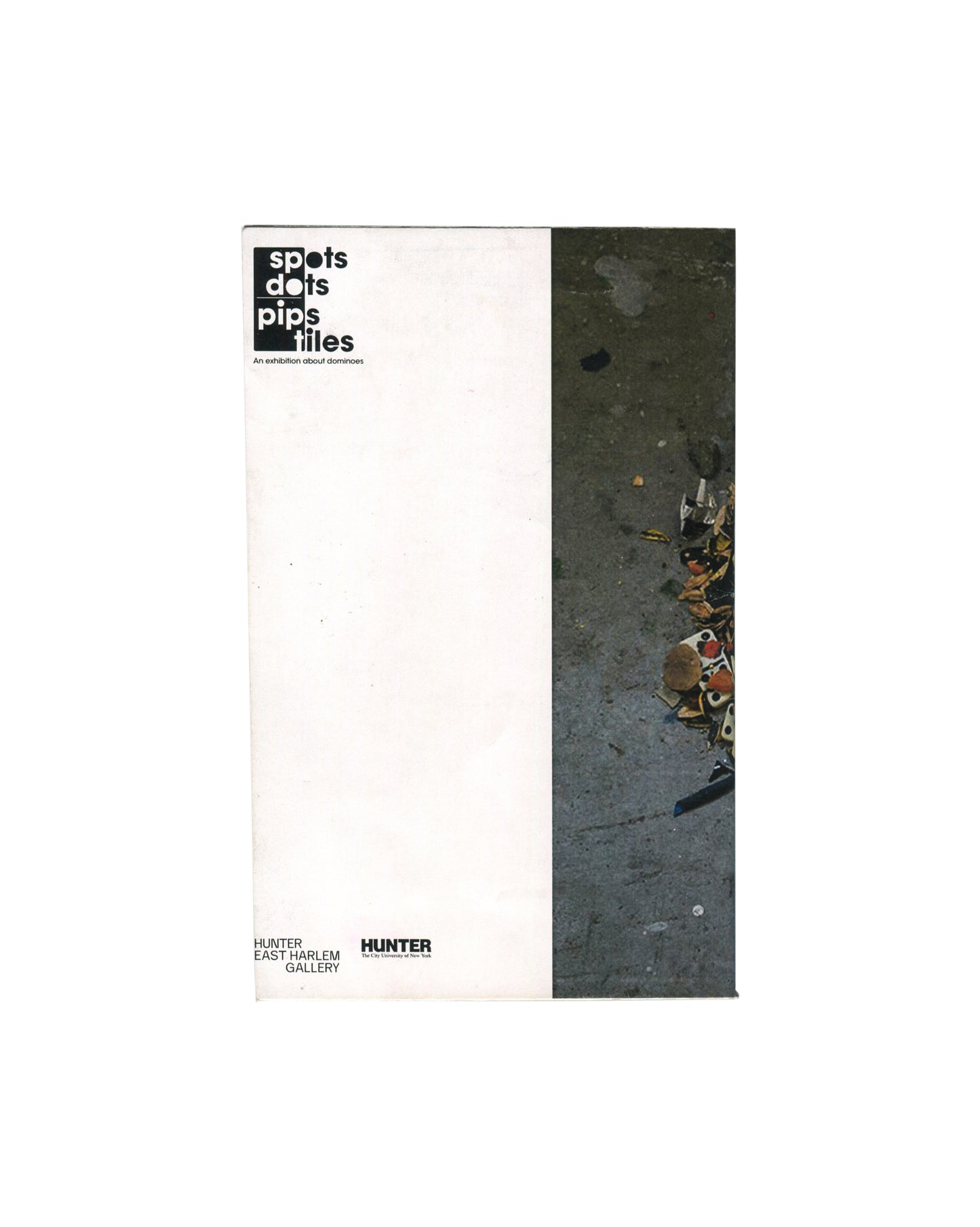 Full-bleed colour photograph of a pile of worn ivory-coloured domino tiles with black pips scattered on grey concrete, with exhibition title, dates 'Oct 13, 2016–Feb 11, 2017' in white sans-serif type overlaid top left.