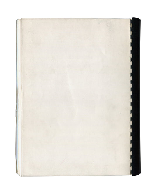 Reverse of 1989 Coup d'envois ou l'art à la lettre Musée de La Poste press dossier showing plain cream-white stock with black spiral binding at right edge, light age toning, surface marks, and soft creasing consistent with archive storage and institutional circulation.