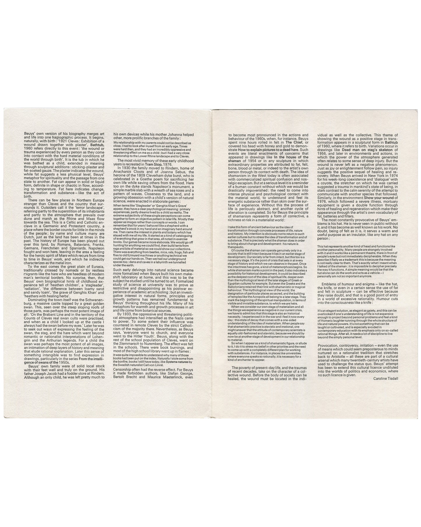 Full opening showing Caroline Tisdall's essay in three columns across both pages — biography, Cleves, wartime mythology, shamanism, fat, felt, wounds. No illustrations.