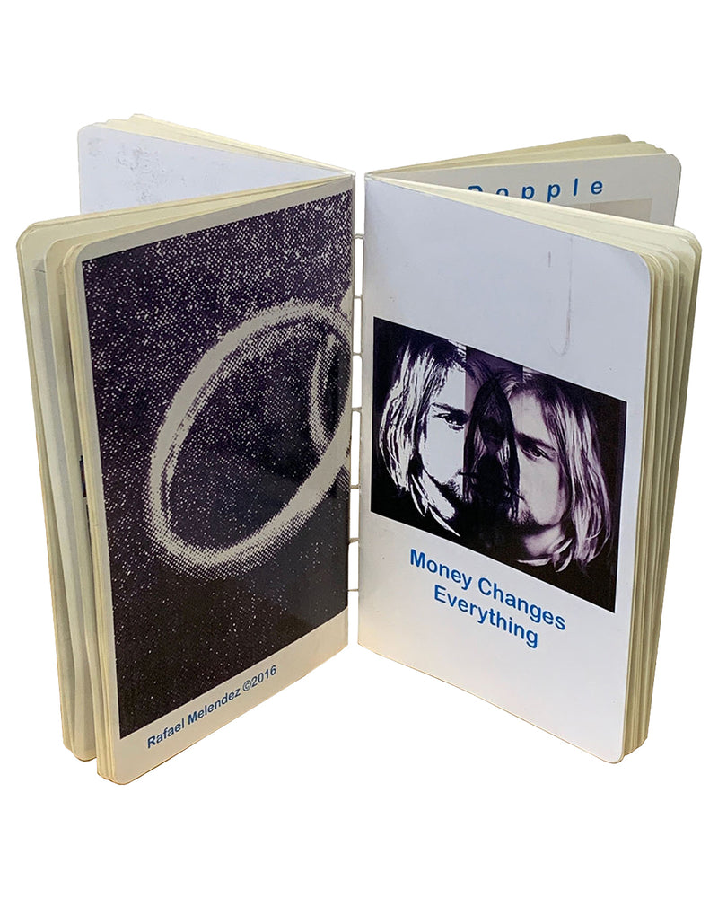 Already applied to the listing:

> Rafael Melendez, *Born to Die*, 2016 — unique artist's book open to interior spread; left page shows circular form on dark denim-textured ground with 'Rafael Melendez ©2016' credit; right page shows black-and-white portrait of Kurt Cobain with blue text 'Money Changes Everything'; dos-à-dos binding visible at spine

