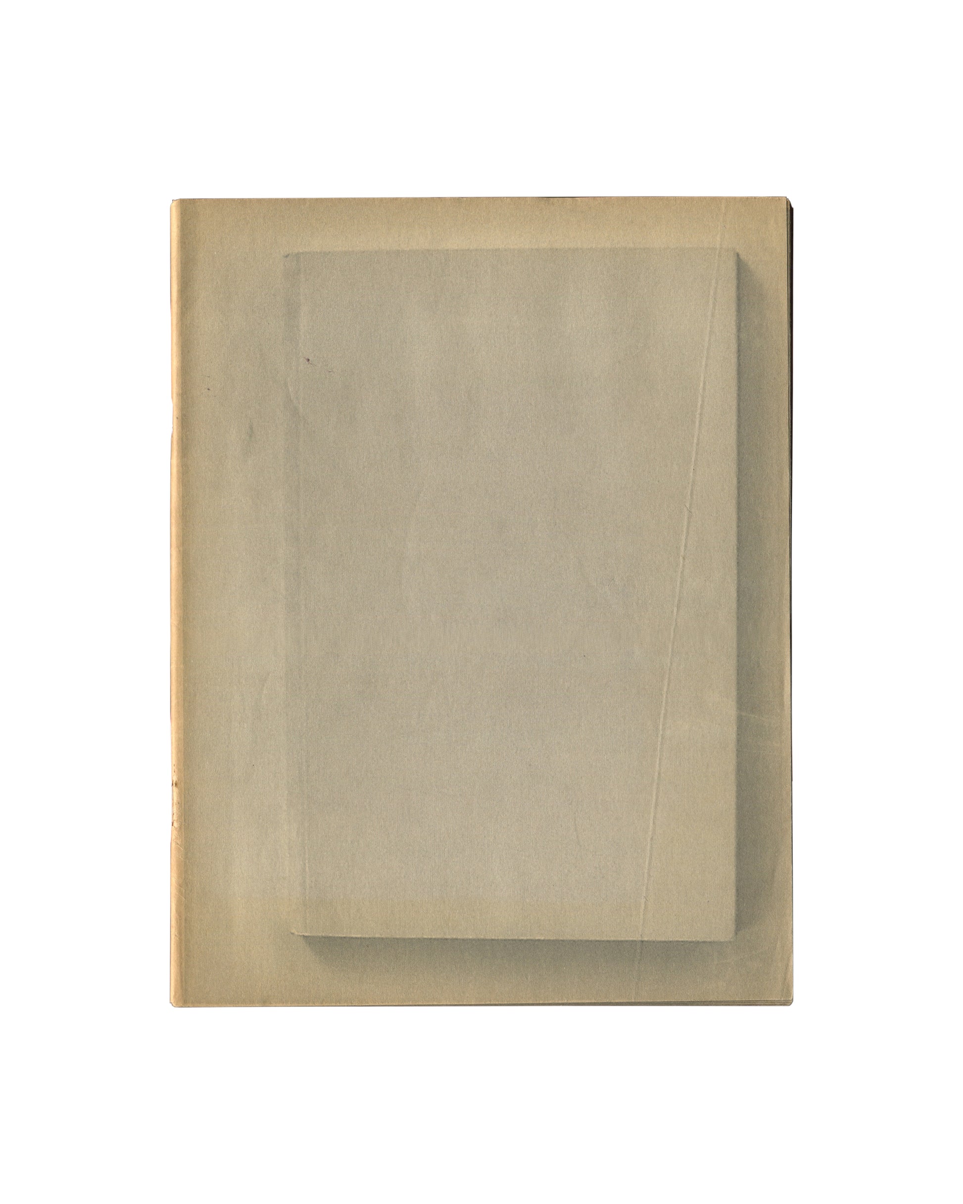 Original c. 2002 Mark Borthwick Xerox edition of 2000-1, Maison Martin Margiela. Front cover showing a plain unprinted tan-beige softcover with no title, text or image — only the warm, slightly uneven surface of the photocopied paper wrapper, with a faint inset rectangular panel visible at centre, and visible age toning and handling wear. 21.0 × 27.2 cm.