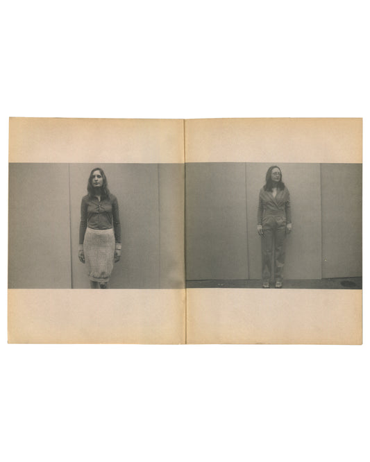 nterior spread of c. 2002 Mark Borthwick Social Documentaries Amid this Piste, self-published photocopy edition. Double-page spread showing two grayscale Xerox photographs of a woman standing facing the camera against a plain studio wall: left image showing her in a dark zip-up top and a pale pleated midi skirt with white cuffs or wristbands; right image showing the same woman in a dark belted jacket and trousers with white cuffs, standing slightly further from the wall. Both images printed as horizontal ba