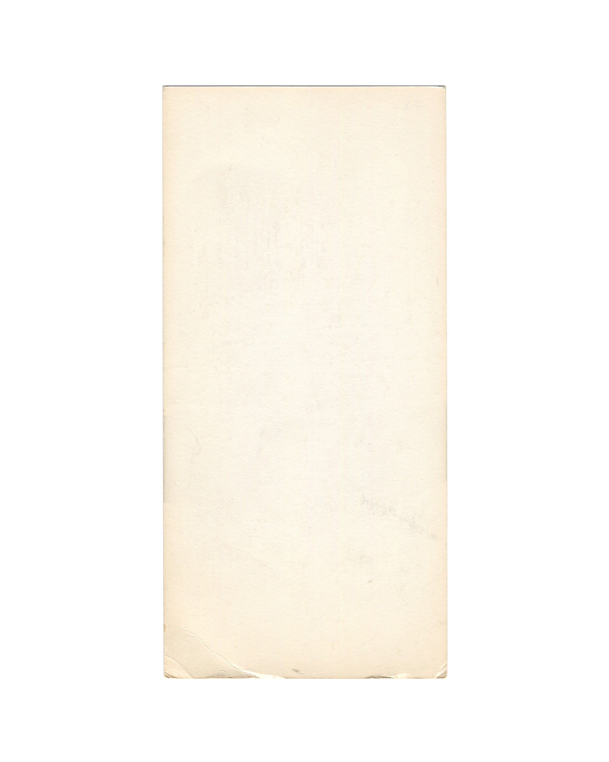 Reverse of 1971 Monique Boucher L'air pauvre Les Aliscans librairie Paris invitation card showing plain cream-white thin card stock with warm age toning, light surface marks, and visible creasing and handling wear to lower corners consistent with fragile early-1970s paper ephemera.