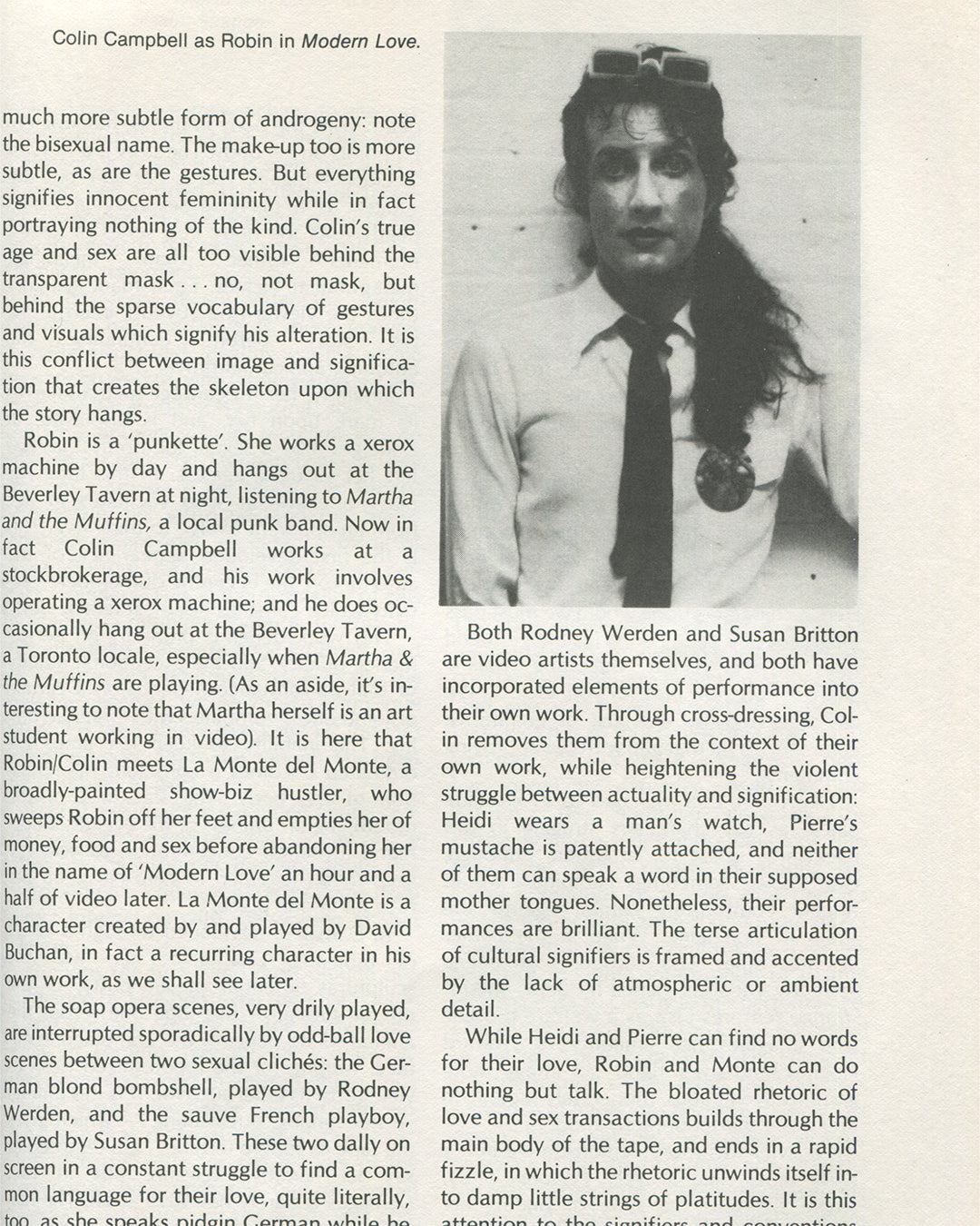 Interior spread from 1979 Performance by Artists, Art Metropole. Colin Campbell as Robin in Modern Love, showing a black-and-white photograph of a figure with long hair and tie, alongside extended critical text on video performance, cross-dressing, and signification.