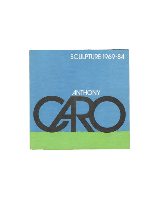 Anthony Caro, Sculpture 1969–84, Arts Council, 1984, front cover, CARO in black letters on green ground under blue sky