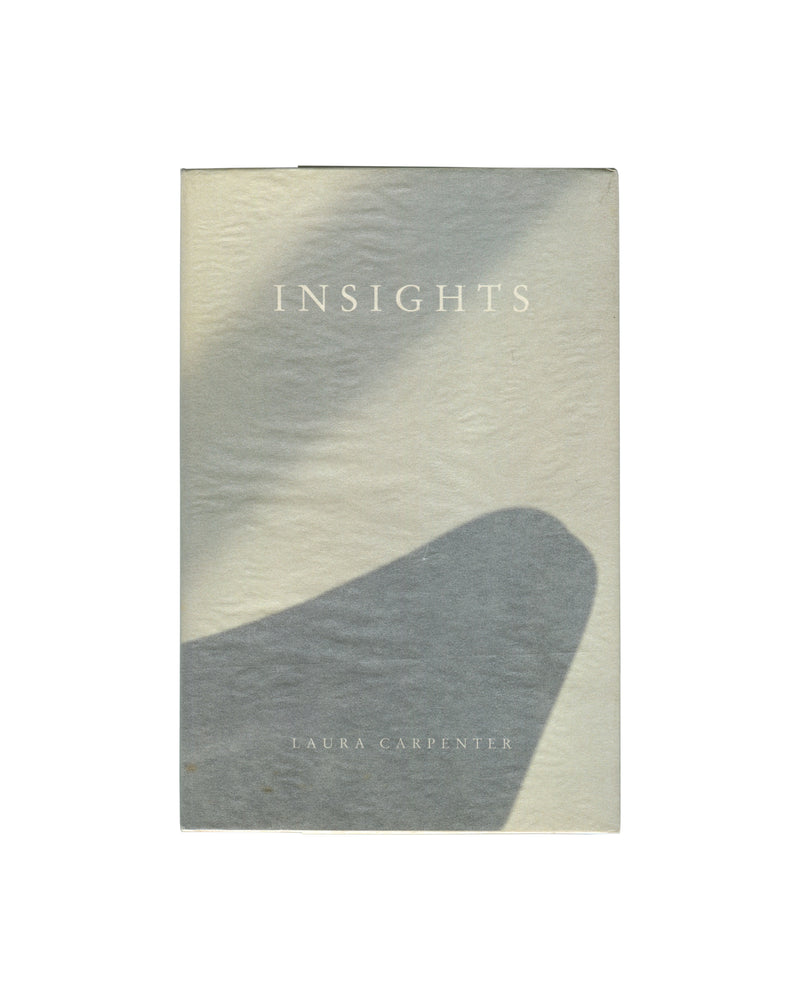 Original 1990 Laura Carpenter / Philippe Thomas, Insights, Galerie Claire Burrus, Paris. Softcover with a close-up black-and-white photograph of a curved shadow cast across a pale textured surface, suggesting a body or sculptural form. 'INSIGHTS' in spaced white serif capitals at upper centre, 'LAURA CARPENTER' in smaller spaced white serif type at lower centre. Light surface wear and minor corner softening consistent with period.