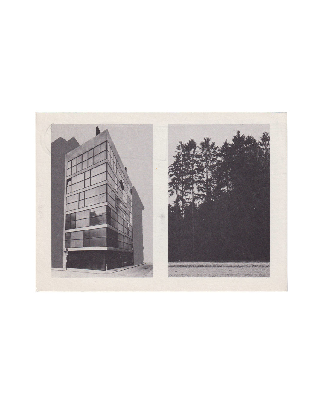 Charles Simonds, The Three Trees, 1985 — recto: offset-printed exhibition card showing two black-and-white photographs side by side, a modernist glass-façade building and a dense stand of conifers, on light card stock
