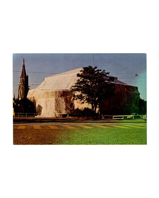 Christo and Jeanne-Claude, Wrapped Kunsthalle Bern, 1968, colour photograph by Balthasar Burkhard, building wrapped in polyethylene and nylon rope, recto
