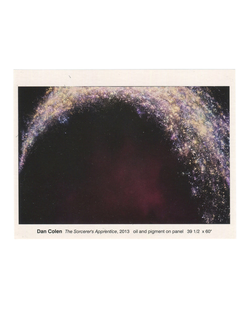 Dan Colen, The Sorcerer's Apprentice, gallery announcement card recto. The Greenberg Gallery, St. Louis, 2013. Colour reproduction of a painting: a dense arc of scattered pigment — white, lavender, blue, gold, and pink — curves across the upper portion of a deep black ground, suggesting a galaxy, firework burst, or spray of glitter. A dark reddish-brown mass occupies the lower centre, partially obscured by the arc. The image bleeds to the edges of the printed rectangle. Caption below in small sans-serif typ