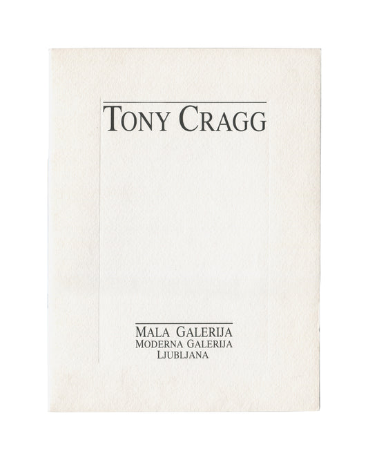  Front cover Tony Cragg, Moderna Galerija / Mala Galerija, Ljubljana, 1992–93. Exhibition catalogue front cover: textured white card with "Tony Cragg" in large black serif type within a ruled black border upper centre; "Mala Galerija / Moderna Galerija / Ljubljana" in spaced black serif capitals lower centre. Plain white ground. 29 × 21 cm. Light surface marking and edge wear.