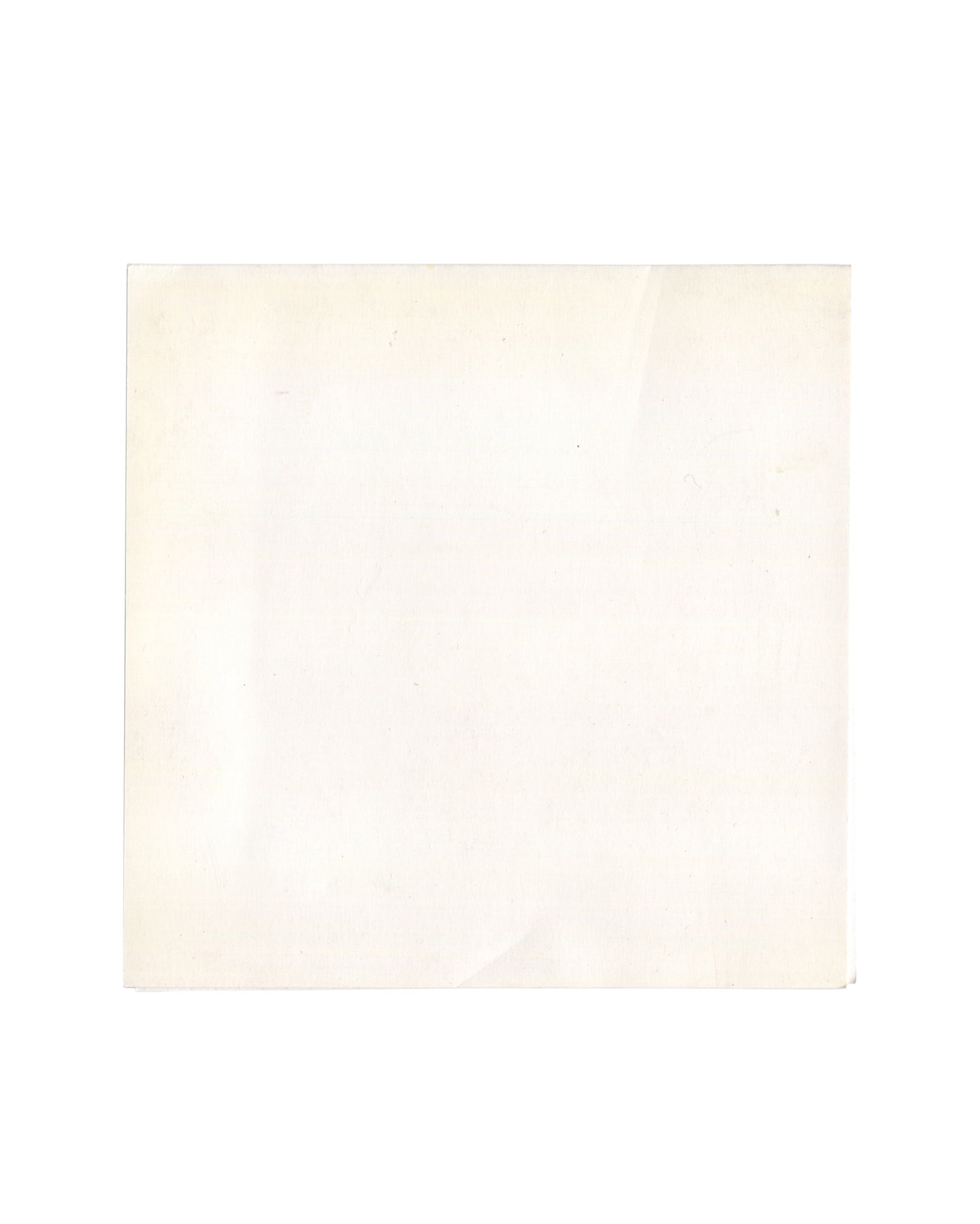 Reverse of 1999 Centre Wallonie-Bruxelles Dada Surréalisme Avant-Gardes invitation, showing plain cream card stock with light age toning and faint surface marks.