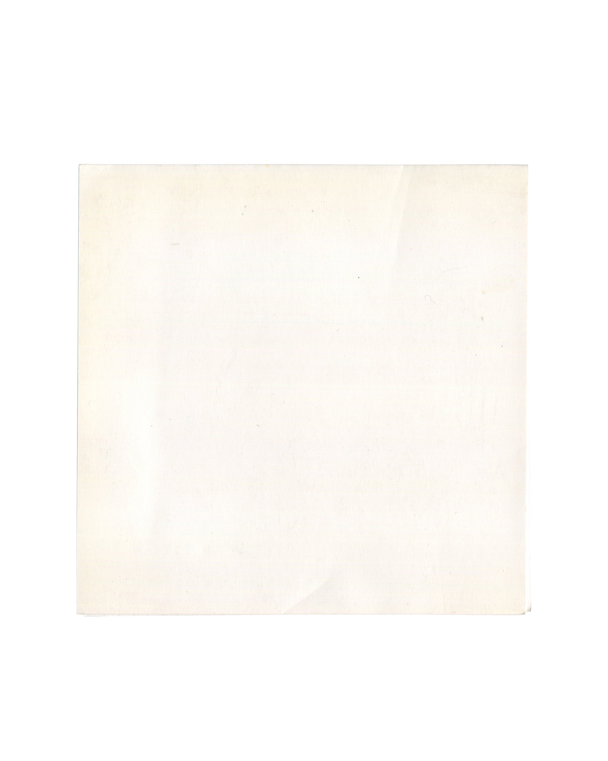 Reverse of 1999 Centre Wallonie-Bruxelles Dada Surréalisme Avant-Gardes invitation, showing plain cream card stock with light age toning and faint surface marks.