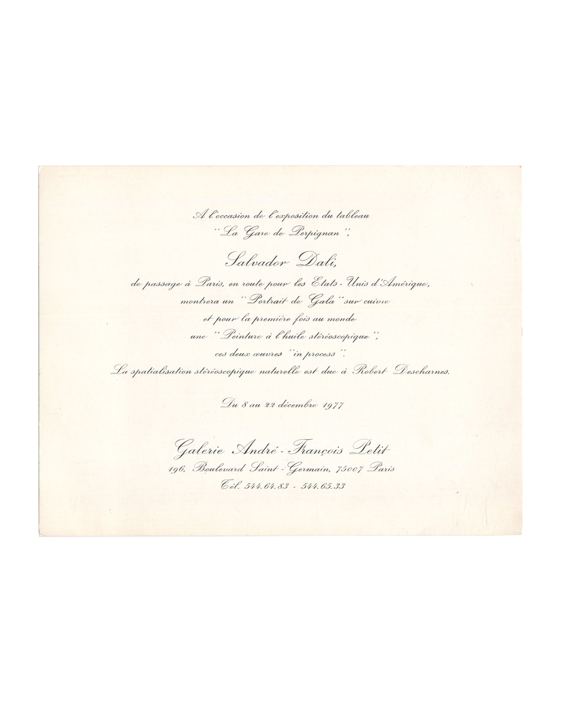 1977 Salvador Dalí La Gare de Perpignan Galerie André François Petit Paris exhibition card. Recto: cream stock with italic script typography reading 'Salvador Dalí / La Gare de Perpignan / Célèbre peinture monumentale / exposée en France pour la première fois / entourée de quelques œuvres rétrospectives / Novembre–Décembre 1977 / Galerie André-François Petit / 196, Boulevard Saint-Germain, 75007 Paris.