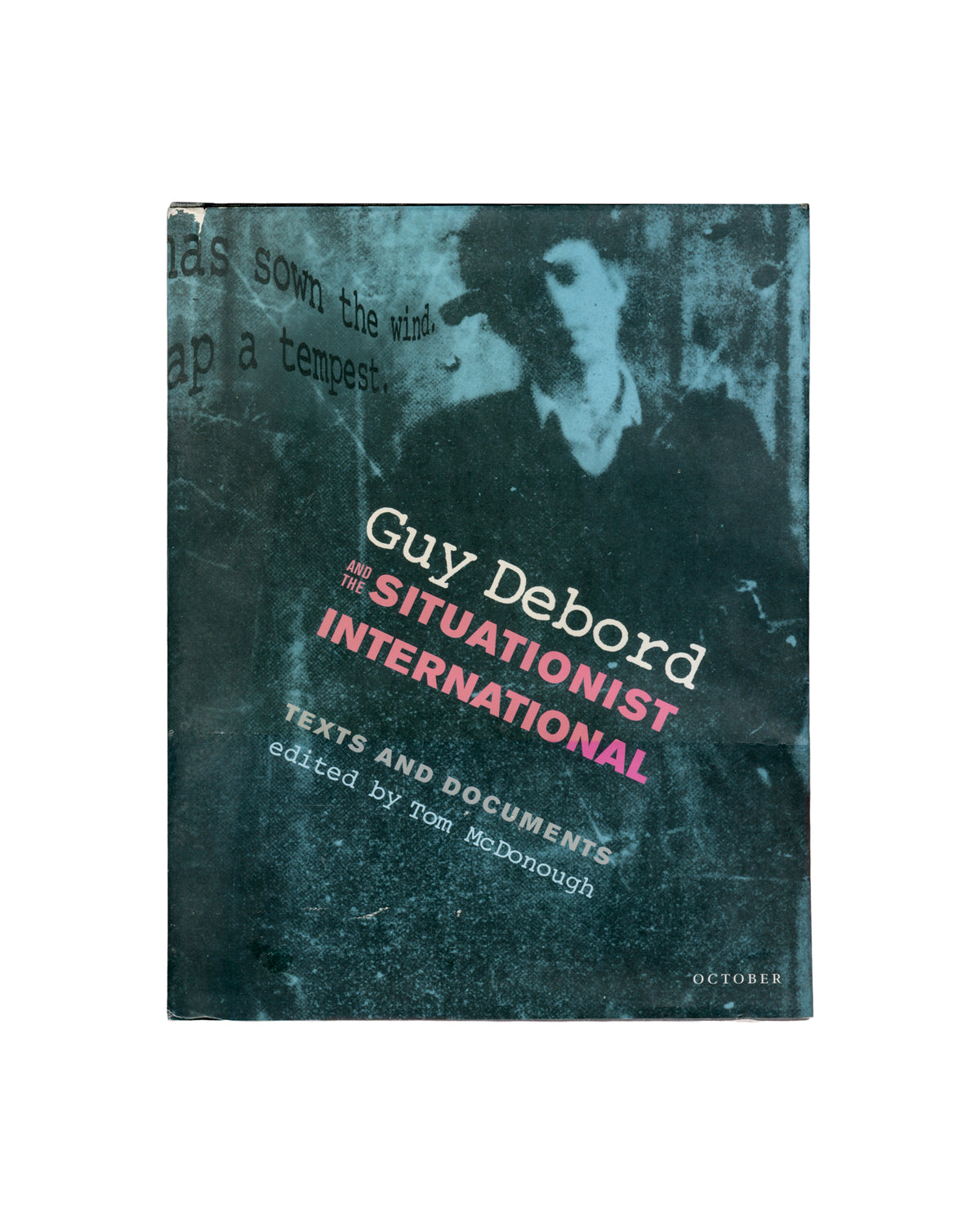 Guy Debord and the Situationist International, ed. Tom McDonough, MIT Press 2002, front cover: degraded photographic portrait overprinted with pink and white title type