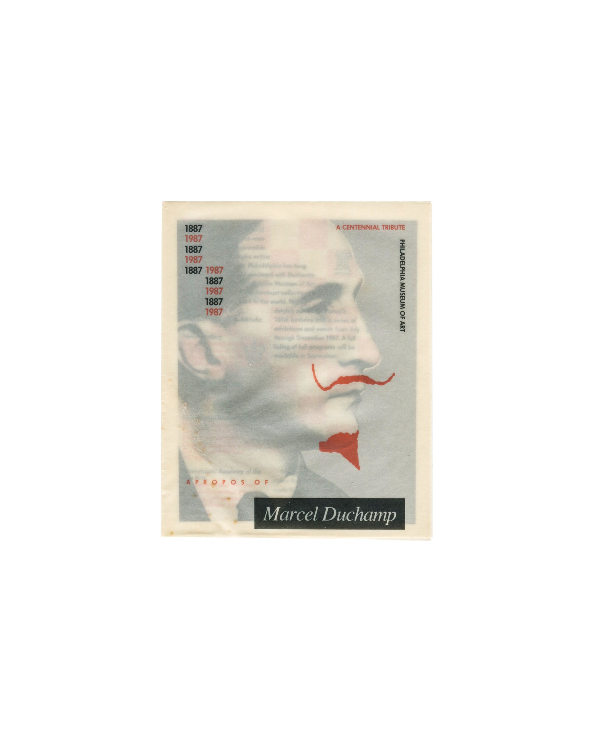 Marcel Duchamp centennial programme cover, Philadelphia Museum of Art, 1987; profile portrait with red moustache, translucent stock