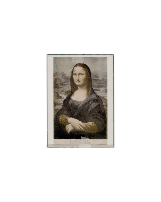 Marcel Duchamp, L.H.O.O.Q., 1919. MoMA postcard, 2006. Recto: colour reproduction of Duchamp’s rectified readymade — a commercially printed Mona Lisa with pencil moustache and goatee added to the figure’s upper lip and chin; warm sepia and grey tones; landscape background visible; ‘L.H.O.O.Q.’ inscribed in pencil in capitals along the lower edge of the image. Retained in a transparent protective sleeve.